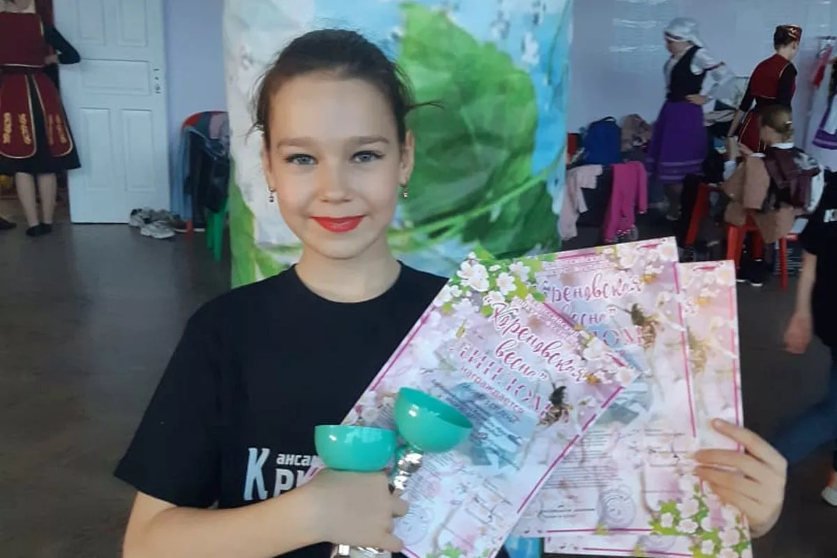 Оля Плахутина 