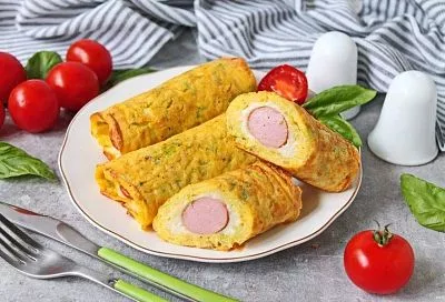 Чудо-трубочки с сосисками на завтрак без теста. Основу составляют яйца и капуста, и дети всегда съедают их первыми