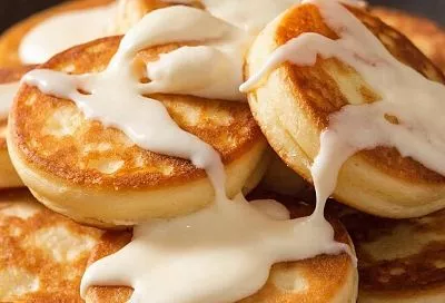 Сырники в сметанной заливке из духовки. Секрет нежности — в волшебной сметанной заливке