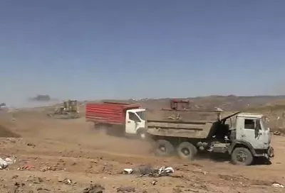 Потушить возгорание на свалке в Ейском районе планируют до конца суток