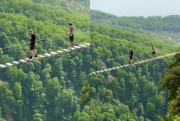 В Сочи двое туристов забрались на подвесной мост без страховки ради фотографий 
