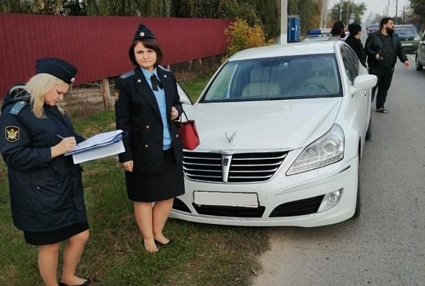 Арест иномарки заставил жителя Славянского района расплатиться с долгами